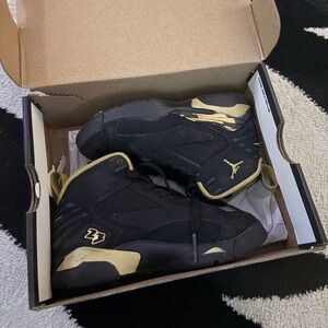 Jordan Sneakers with Black and Gold Highlights